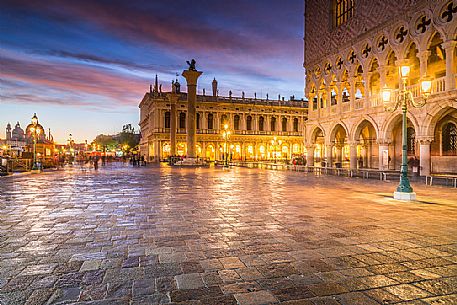 Piazza San Marco at dusk, with the Marciana Library, the columns of San Todaro and San Marco and the Doge's Palace, Venice, Italy, Europe