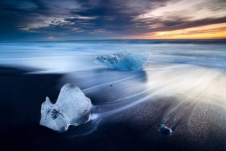Icebergs on the black sand beach near Jokulsarnon glacier lagoon