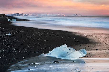 Icebergs on the black sand beach near Jokulsarnon glacier lagoon